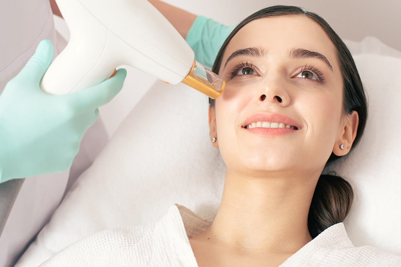 woman-receving-laser-treatment-on-face